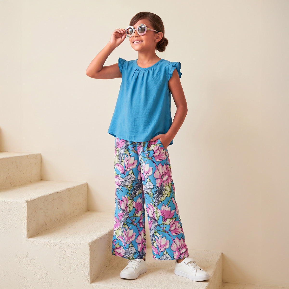 Conjunto de blusa de olanes y pantalón floreado • 4 a 12 años • Ariana 12 A