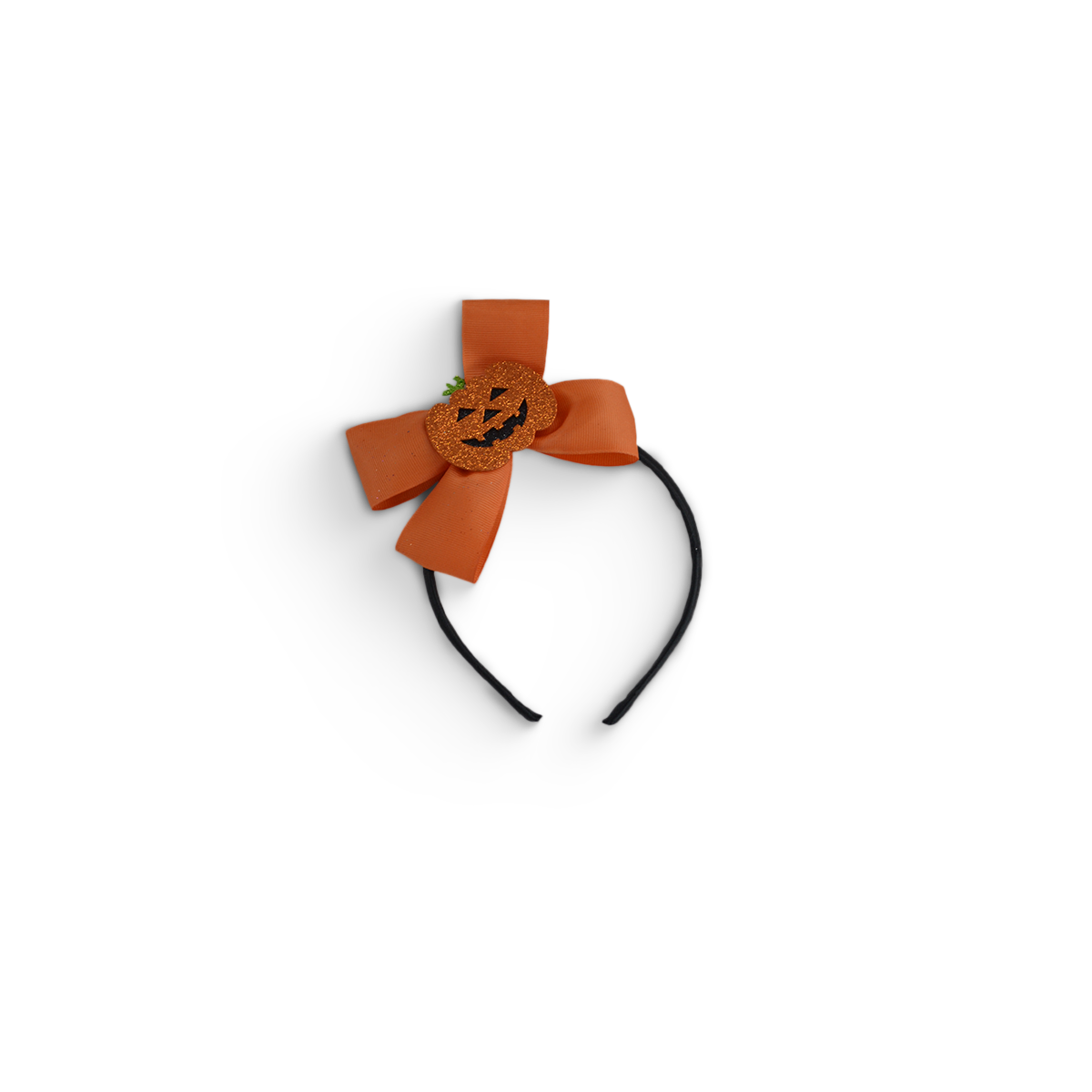 Diadema negra con moño naranja y adorno de calabaza de Halloween en el centro.