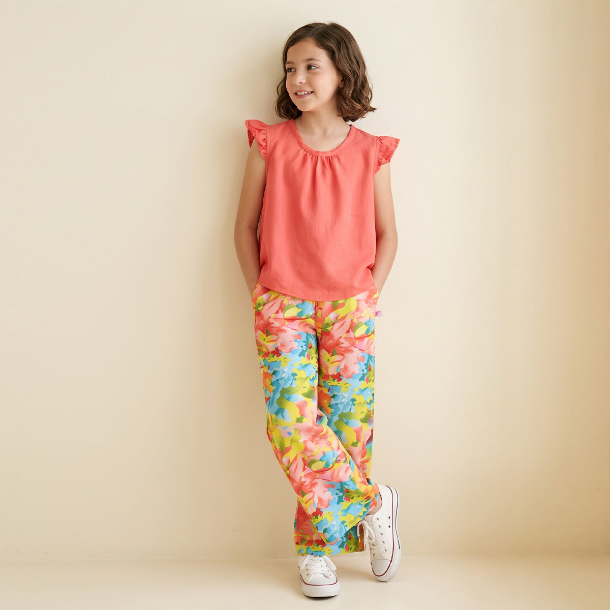 Conjunto de blusa de olanes y pantalón floreado • 4 a 12 años • Ariana 12 D