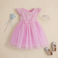 Vestido de satin floreado con moños  •  1 a 3 años  • Paola 2