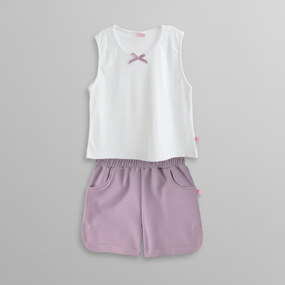Conjunto Sort Básico con bolsillos y blusa con moño • ARIANA 8 • tallas 12-14-16 • COJU0007