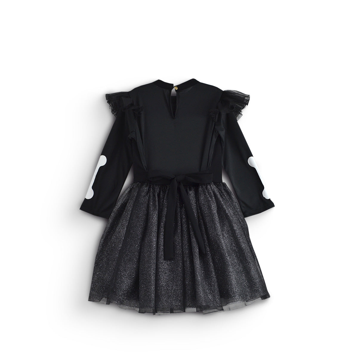 Vista trasera de vestido infantil negro de esqueleto, con mangas largas, volantes en los hombros y falda de tul brillante.