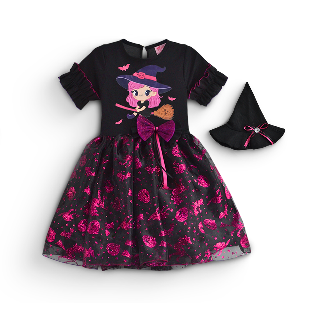 Vestido infantil negro con brujita estampada, moño fucsia y falda con motivos fucsias, junto a sombrero de bruja a juego.