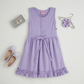 Vestido con botones y moño  •  4 a 11 años  • Natali 11