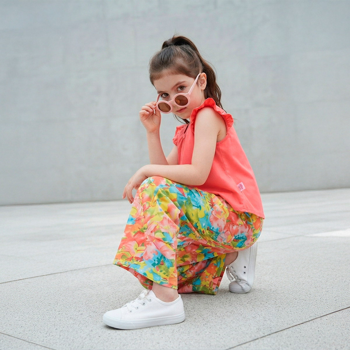 Conjunto de blusa de olanes y pantalón floreado • 4 a 12 años • Ariana 12 D