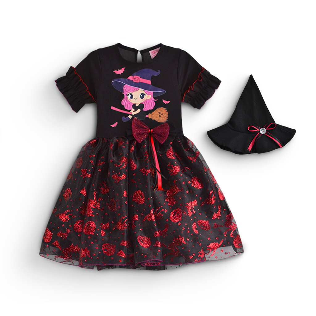 Vestido infantil negro con brujita estampada, moño rojo y falda con motivos rojos, junto a sombrero de bruja a juego.